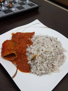 A picture of Local rice and pepper stew.
