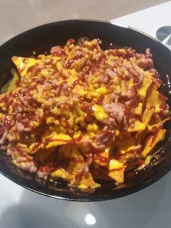 Una foto de Nachos con queso