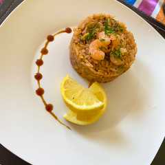 Una foto de Arroz con mariscos 🦐
