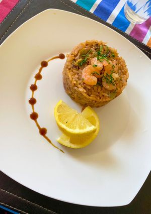Una foto de Arroz con mariscos 🦐