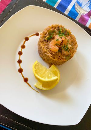 Una foto de Arroz con mariscos 🦐