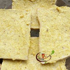 A picture of Tumeric buttered bread.