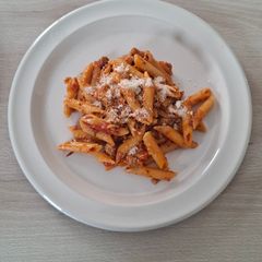 A picture of Creamy Tomato Penne with Pork and Basil.