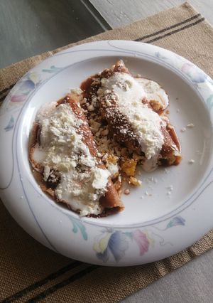 A picture of Guajillo and Ancho Chile Enchiladas Stuffed with Eggs.