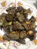 Asadura de cordero encebollada