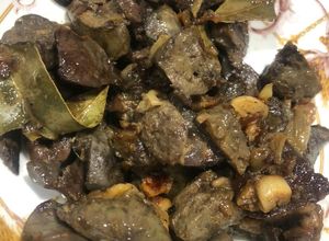 Foto principal de Asadura de cordero encebollada