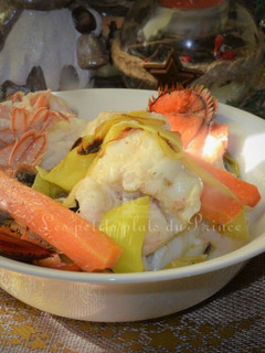 Une photo de Cocotte lotte et homard en sauce crémée pour le Nouvel An