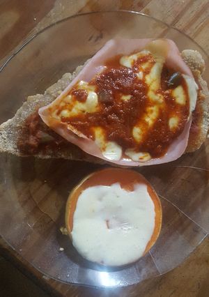 Una foto de Milanesa de carne napolitana con calabaza con queso!!