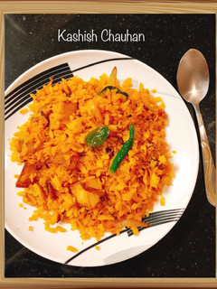 A picture of 🌈 Poha - Flattened Rice Dish.