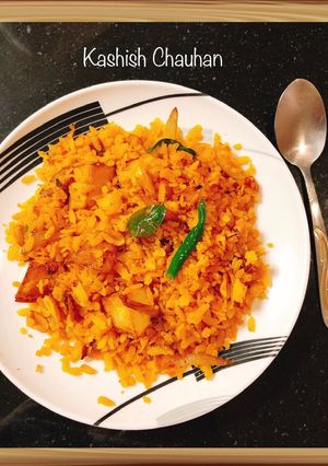 A picture of 🌈 Poha - Flattened Rice Dish.