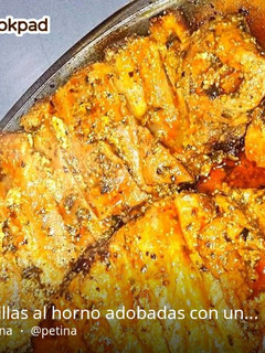 Una foto de Costillas al horno a la mostaza y miel con patatas panadera