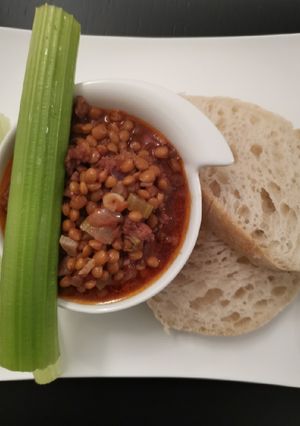 A picture of Italian Sausages in Lentil sauce.