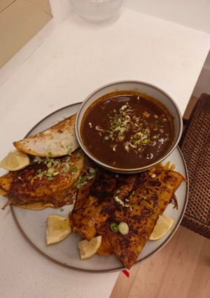 A picture of Birria Tacos.