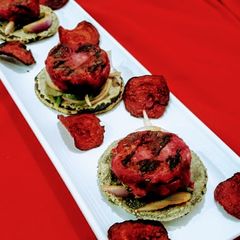 A picture of Beetroot canapés on bajra roti.