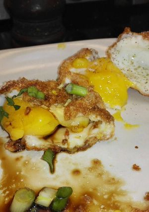 A picture of Deep fried eggs.