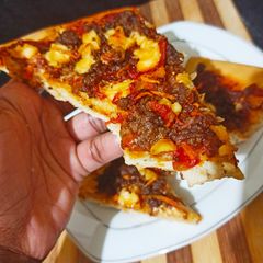 A picture of Homemade beef pizza.