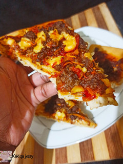A picture of Homemade beef pizza.