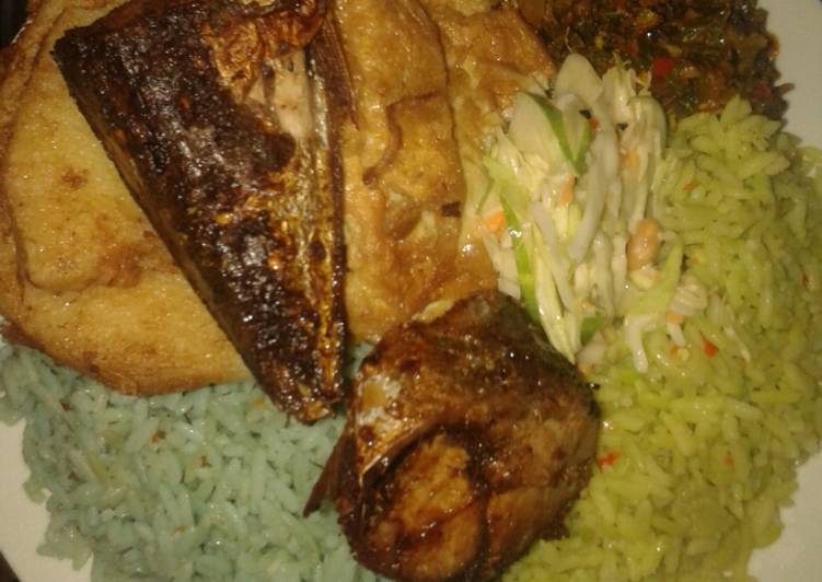 Jellof rice, yam n egg, cous low, friedfish and veg source