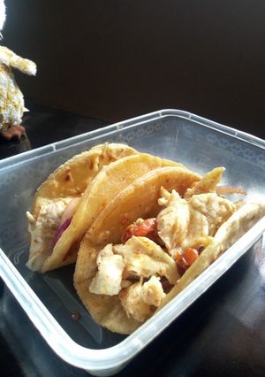 A picture of Potato bread and scrambled eggs tacos.