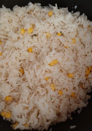 A picture of White Rice with Corn.