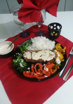 A picture of Beef steak with creamy sauce.