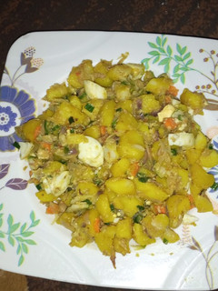 A picture of Turmeric potato in Egg and Veggies.