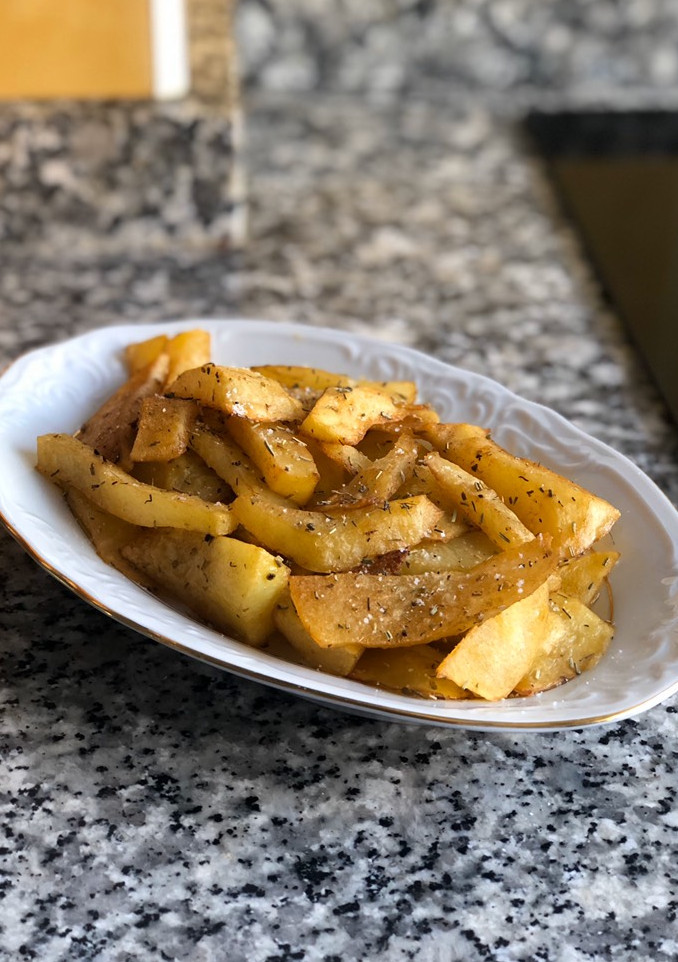 Una foto de Patatas especiadas al horno🥔