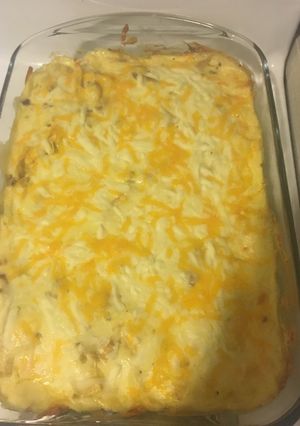 A picture of White sauce enchiladas.