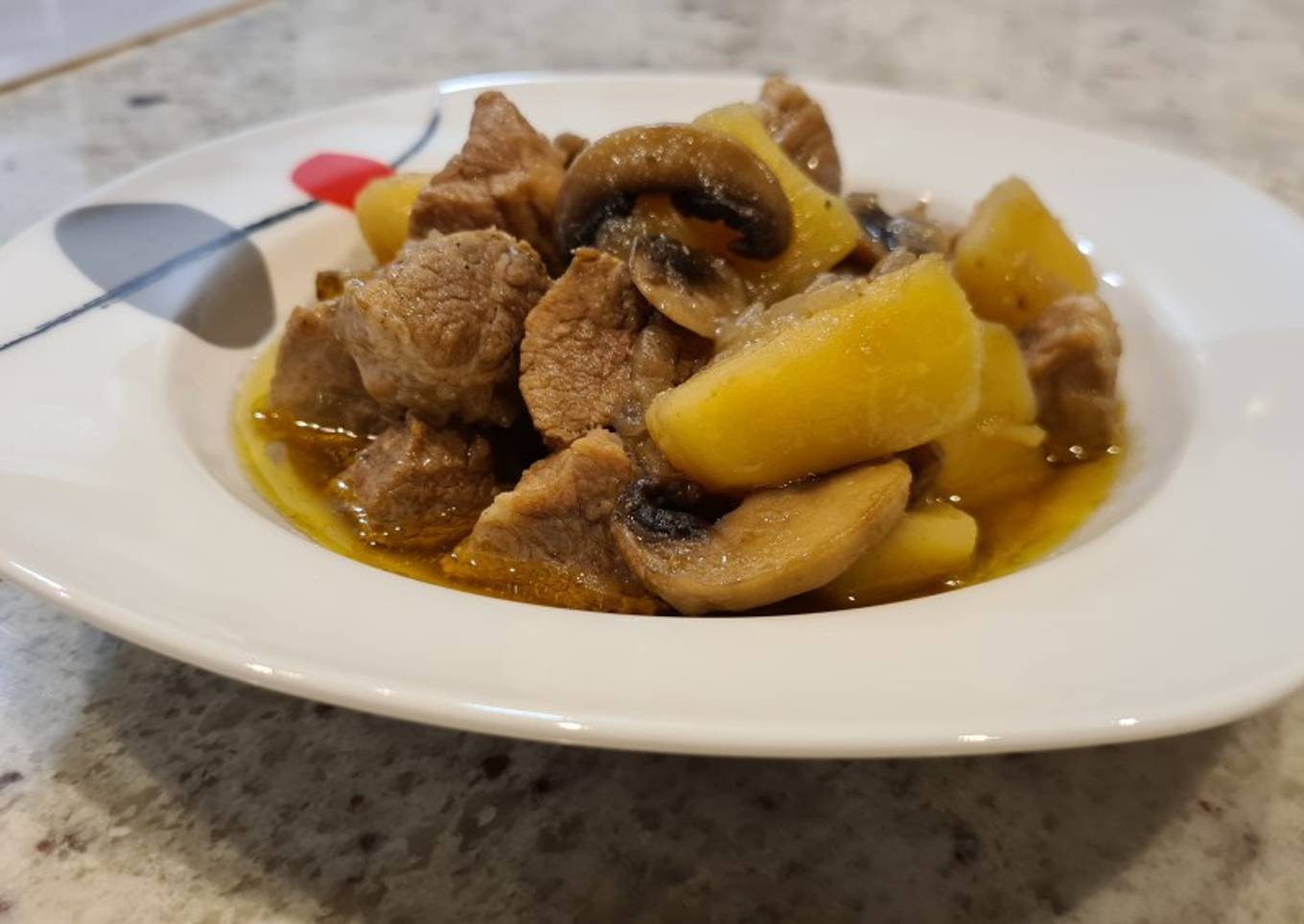 Estofado de cerdo con champiñones