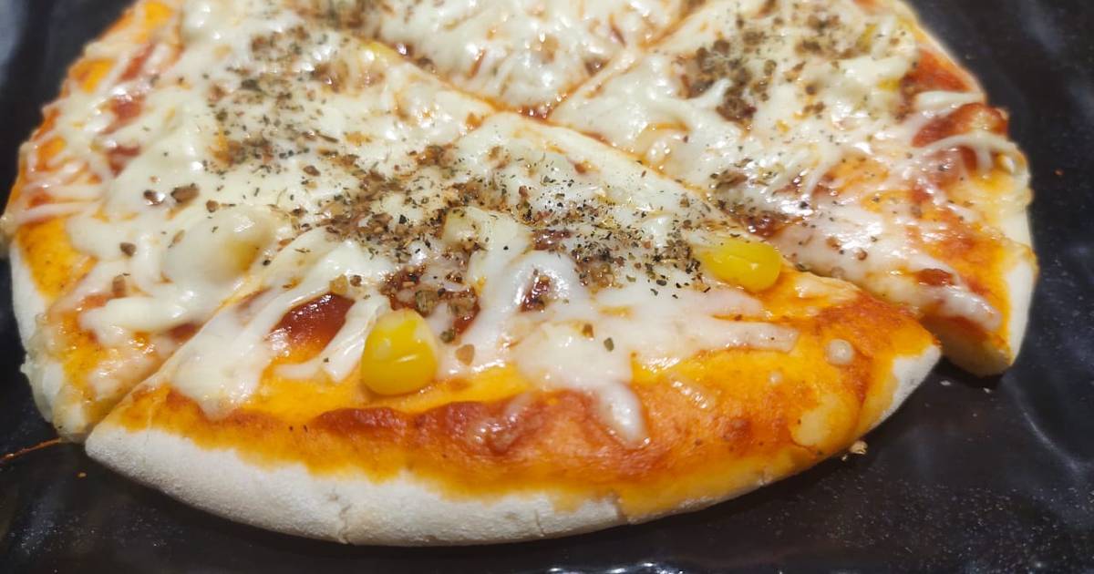 Corn cheese pizza Recipe by Janvi Joshi Cookpad