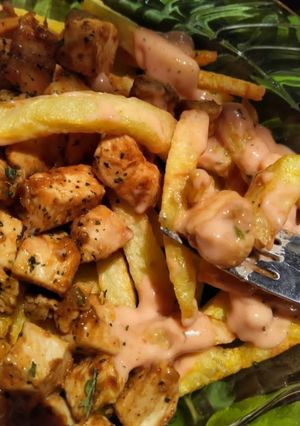 A picture of Chicken loaded fries 🍟.