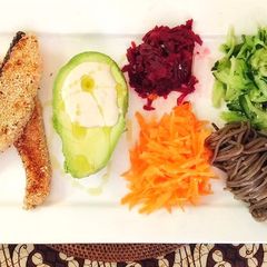 A picture of Sesame seared salmon, Tahini avocado and shred salad.