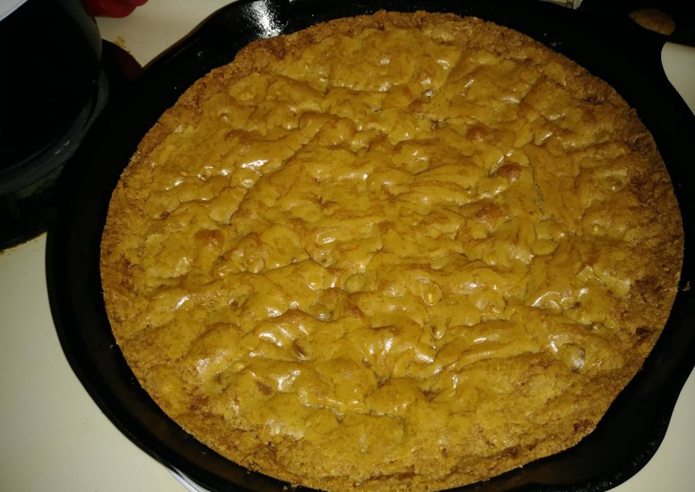 Chocolate chip cookies with walnuts in a cast iron pan