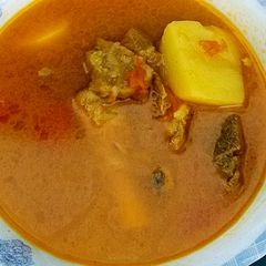 A picture of Aloo gosht.
