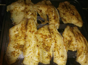 Una foto de Pescado tilapia al horno en ajo
