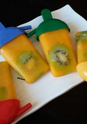 A picture of Mango-Kiwi Popsicles.