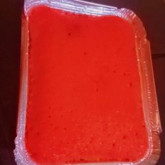 A picture of Ty cakes, nice red coloured cake with foil tin.