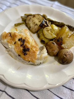 Una foto de Merluza gratinada con mayonesa de ajo