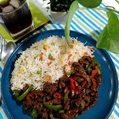 Dry beef chilli with fried rice A picture of Dry beef chilli with fried rice.