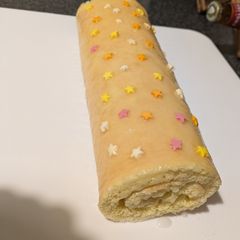 A picture of Lemon curd Swiss roll.