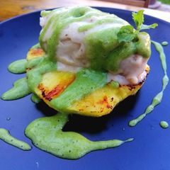 A picture of Grilled pineapple/ banana ice cream/lime and mint sauce.