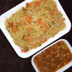 Egg fried rice with vegetable soup A picture of Egg fried rice with vegetable soup.