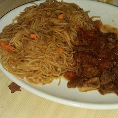 A picture of Spaghetti with beef stew.