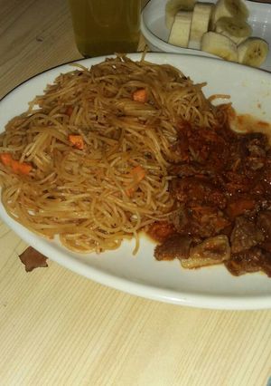 A picture of Spaghetti with beef stew.