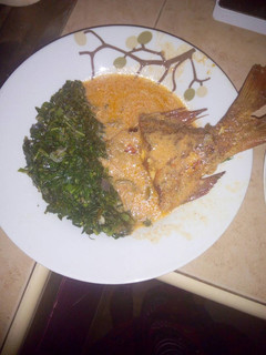 A picture of Marinated fish (samaki wa kupaka) with coconut soup..