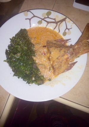 A picture of Marinated fish (samaki wa kupaka) with coconut soup..