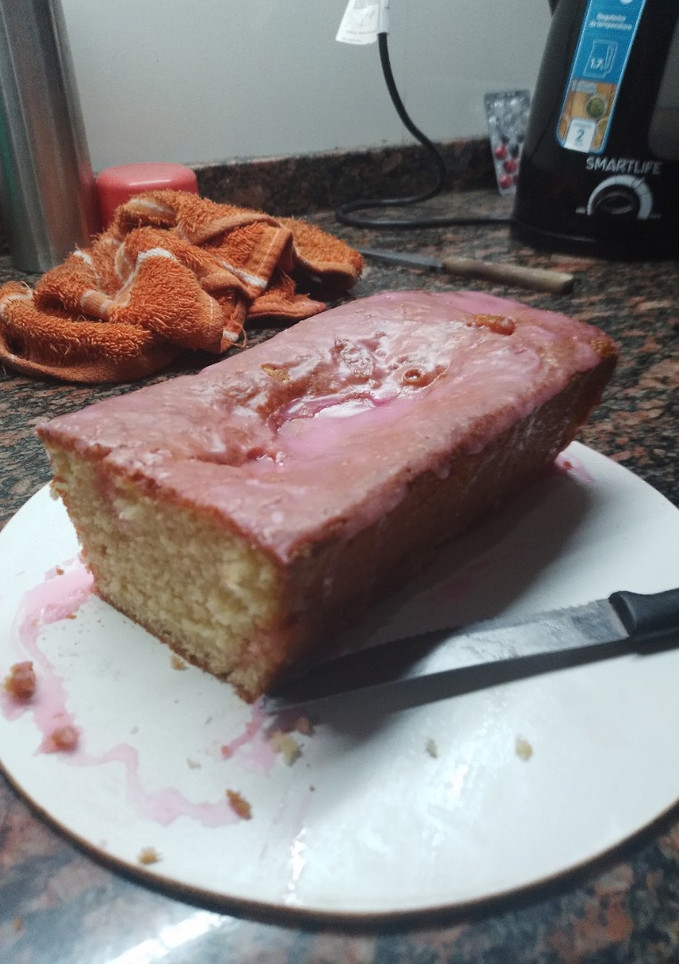 Una foto de Budín de naranja 🍊glaseado 😋