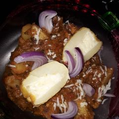 A picture of Cheese stuffing dum aloo(potato).