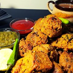 A picture of Dakor Na Gota | Gujarati gram flour fritters.