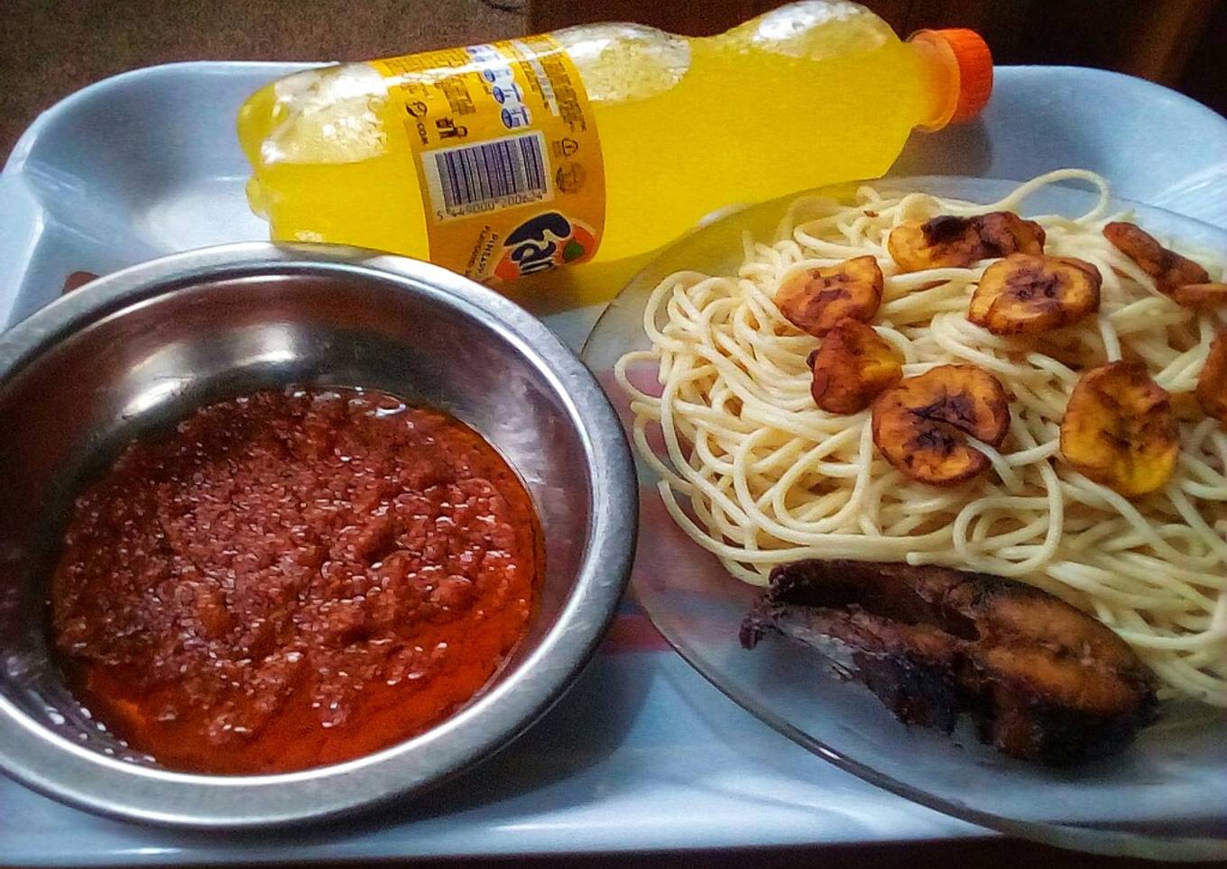 Signature fish sauce spaghetti and fried plantain
